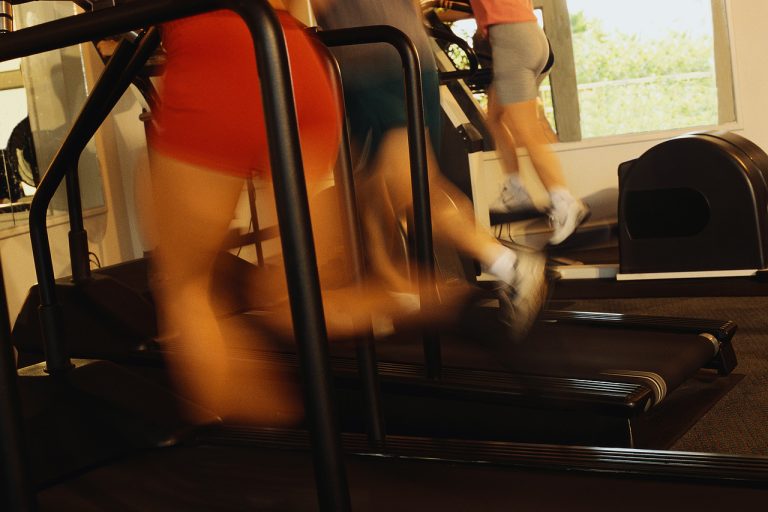 Women Running on Treadmills