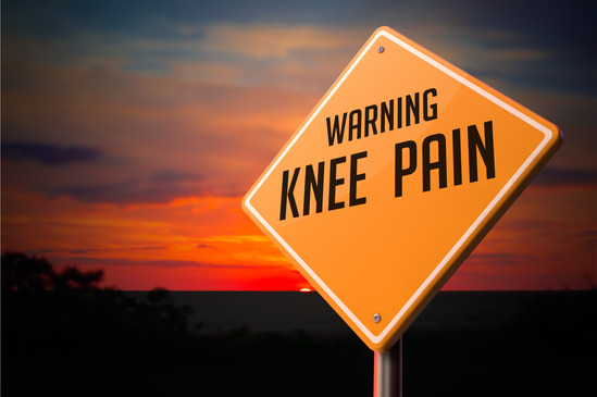 photodune-12661142-knee-pain-on-warning-road-sign-xs