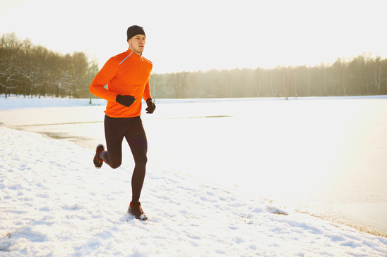photodune-14415658-young-man-running-at-winter-in-park-xs