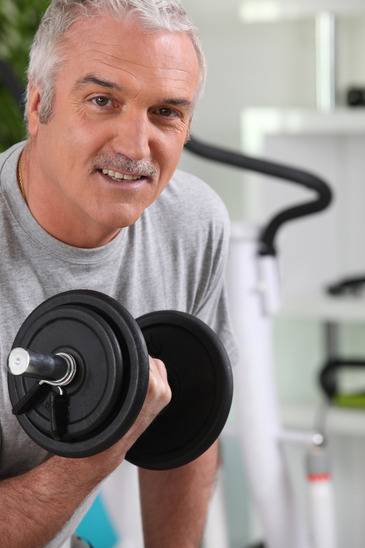 photodune-2102088-mature-man-working-out-with-a-dumbbell-xs