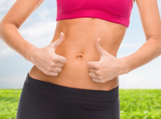 photodune-7667970-close-up-of-female-abs-and-hands-showing-thumbs-up-xs