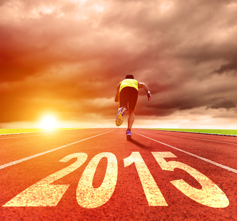 photodune-8895113-happy-new-year-2015-young-man-running-with-sunrise-background-xs