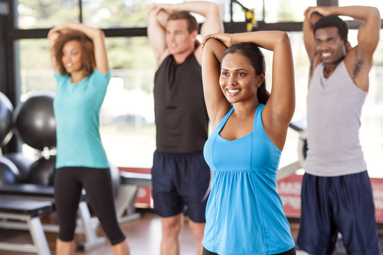 photodune-9589264-multiethnic-group-stretching-in-a-gym-xs